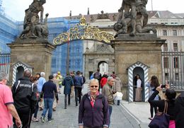 Photo of Linda at the gate to the Prague Castle Linda is at the front gate of the castle. We toured the castle then walked down the hill visiting different sites along the way. A very comfortable tour. , Frank P - June 2015