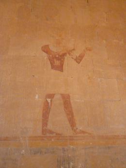 Photo of the queen herself the queen herself depicted on the walls of the temple dressed as a Pharaoh with a dark body and a man's dress but she kept her face light to indicate she was a woman. they did not have a word for ... , Fatma A - March 2014