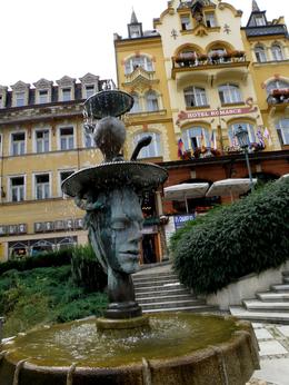 Photo of Karlovy Vary. Two faces fountain Two faces Janus fountain near mineral curative complex. Now you can one face only., Aleksandra B - July 2009
