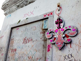 Photo of St Louis Cemetery The grave of Marie Laveau, covered in kisses and voodoo symbols. , Rusty - November 2013
