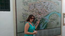 Photo of Walking through Cordoba Our local English guide using map on the street wall to introduce the city of Cordoba to us , Yinching C - July 2016