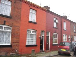 Photo of George's Childhood Home It's the first full one from the left with the bright red brick., Keith R - February 2008