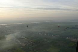 Photo of Morning arrives over the Nile Valley The balloons are but a speck in a beautiful Nile Valley that awakes with the farmers burning the sugar cane!, Beatrice P - January 2009