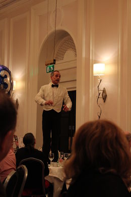 Photo of Manuel waiting on table Basil asks Manuel to wait on the table and make sure his guests have everything they need. , Yvonne T - April 2015