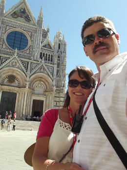 Photo of In front of Siena's Duomo Our tour included the local guide giving us a lovely tour inside the Duomo; it was beautiful! , dyeaton66 - July 2012
