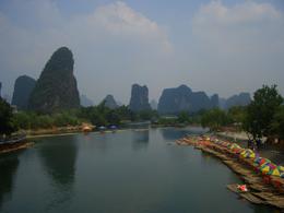 Photo of River Bamboo rafts are waiting by the riverside to take people on a cruise down the river - May 2012