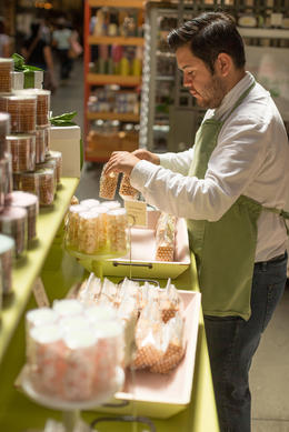 Photo of San Francisco Food Tour: Ferry Building and Ferry Plaza Farmers Market Organizing the macarons for the day, Viator Insider - June 2014