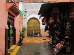Photo of Souk, stall and mosque Great combination of a souk, stall and mosque in Marrakech's medina - February 2010