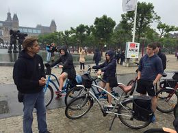 Photo of Bike tour - Amsterdam First stop in the Museum district on a 12K bicycle tour of Amsterdam. That's our tour guide on the left. Cold and rainy weather did nothing to take away from a great day wheeling around the city. , Ellen M - July 2015