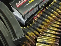 Photo of Lots of clips, cartridges and belts o bullets. This is a small sampling of the environmentally friendly ammo we enjoyed. No lead and recycled casings and belts. Cool!, Jeff - October 2010