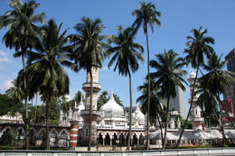 Photo of Famous mosque Masjid Jamek in Kuala Lumpur Famous mosque behind the palms in Kuala Lumpur, Malaysia - Masjid Jamek - July 2011