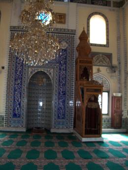 Photo of small local mosque in Izmir beautiful interior of a small local mosque in Izmir showing tile work and wood carving, as well as chandelier , Linda Abbott T - March 2013