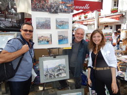 Photo of Buying Some Local Art!! Here is Jeff with Belen and the artist, Walley! Belen gave us very informative hints when looking at the local artists and their work which lead to our purchase! , Scott R - June 2015