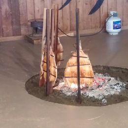 Photo of Whats cookin?!? This is the view of salmon cooking, you see this upon entry to the building. , Josh M - August 2016