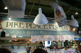 Photo of Pike's Fish Market Stand here for about 20 minutes - interesting place, especially when the clerks call out the orders and start throwing fish around. , Derrick H - June 2014