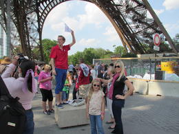 Photo of Paris trip May 2012 040 Nick, the tour guide, talking to us about the history of the Eiffel Tower before we skipped the line and ascended up the elevator. , Phoebe R - June 2012