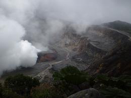 Photo of Poas Crater Poas Volcano: Once the clouds moved out, we were able to capture this magnificent shot of the crater emitting steam and gases - June 2011