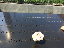 Photo of Birthday Rose A gripping example of how we will never forget - the birthday of each victim of the 9/11 attack is commemorated by the placing of a rose on their name at 6:00am. , James H - June 2015
