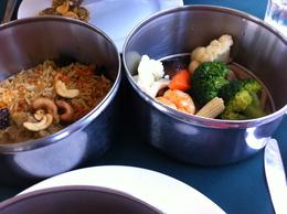 Photo of The food on the train This is the chicken dish and vegetable dish as part of the Tiffen lunch , Janet P - April 2013