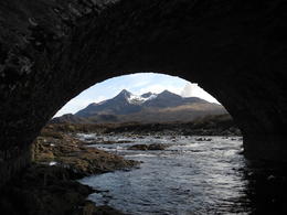 Photo of A view of the Black Cuilins from a bridge We stopped by the river that is said to be enchanted by faeries. The folk tale says that people who wash their face in the river would be beautiful for a year. , Monica K - May 2013