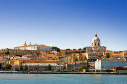 Photo of View of Lisbon from the Tagus River View of Lisbon from the Tagus River. The view is dominated by the Pantheon on the right side of the scene and the convent of Sao Vicent da Fora on the upper left. - November 2011