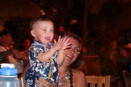 Photo of Hawaii Trip 2012 331 Braeden 1 year old and his mother Jerilyn enjoying the show at the Old Lahaina Luau in Maui. , shirley - April 2012