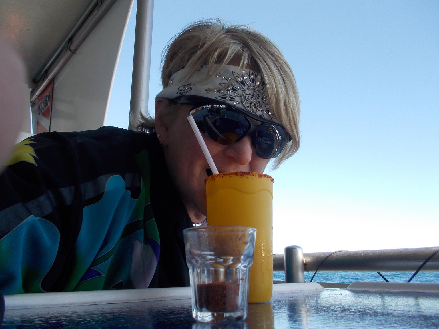 indulging in  and quot;chili powder rimmed mango margarita and quot; enjoying every minute