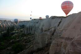 Photo of Balloons in the morning light Hot air balloons head into the valley near Goreme., Peter - October 2010