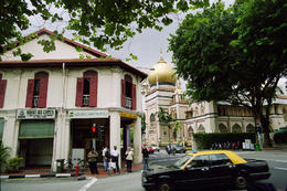 Photo of Arab Street Singapore's Arab Street heritage area. The oldest mosque in the city in the background. Original old shop houses in foreground. - October 2012
