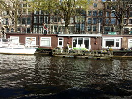 Photo of Houseboats along the canal in Amsterdam A couple of the 2500 permanent houseboats along the canals of Amsterdam, that are now quite pricey. , Brenda A - April 2015