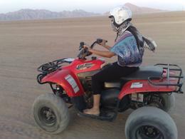 Photo of Riding a quad bike in the Sinai Desert, Egypt My lady, 1st time driving a quad bike on her own! Sinai Desert, Egypt, Robert D - November 2009
