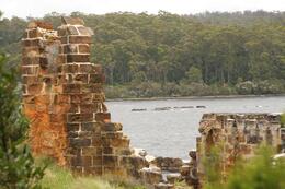 Photo of Sarah Island Smack in the middle of Macquarie Harbour, and a few miles from a huge stand of Huon Pine, the best wood for boat building. The English jailers turned their prison into a boatyard once they realised ... , RobC - December 2010