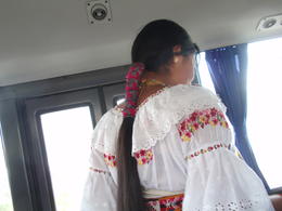 Photo of Entertainment on bus This gal is beautiful - sings lovely and has scarves for sale. 2 for $5. What a good deal. , Dianekay10 - August 2014