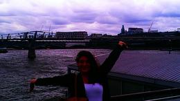 Photo of Me in front of the Millennium Bridge This is me on the boat ride part of the tour on the Thames River. The Millennium Bridge behind me famous in the 6th Harry Potter movie Harry Potter and the Half-Blood Prince. , Kristen A - July 2013