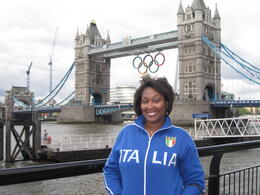 Photo of Tower Bridge Me in front of Tower Bridge with the Olympic rings hanging. I loved behing in London and can't wait to go back again! I need to live there soon. :) , Nikki H - July 2012