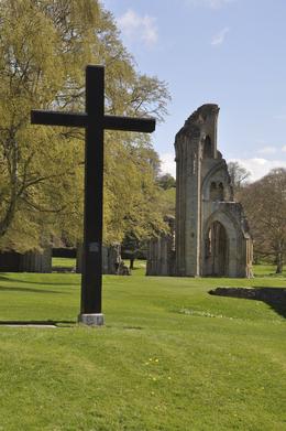Photo of Glastonbury Abbey I love the plaque telling that 'the cross is a symbol of our faith, it marks a Christian Sanctuary so ancient that only legend can record its origin and quot; , marianne k - May 2013
