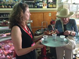 Photo of Sofia handing out tasty samples of cheese, quince paste, and port. Sofia handing out tasty samples of cheese, quince paste, and port. , Sharlene E - June 2015