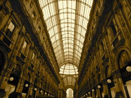 Photo of Galleria Vittorio Emanuele II Walking through the Galleria with famous high fashion shops, like Gucci and Prada, as well as high-end cafes. Beautiful architecture!! After our walk through the Galleria, we ended up at the Duomo ... , Greta Z - January 2013