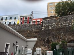 Photo of 60 foot walls and smallest house in Old San Juan The original walls and a house that is now in the space of a former alley way , DIANNE W - November 2015