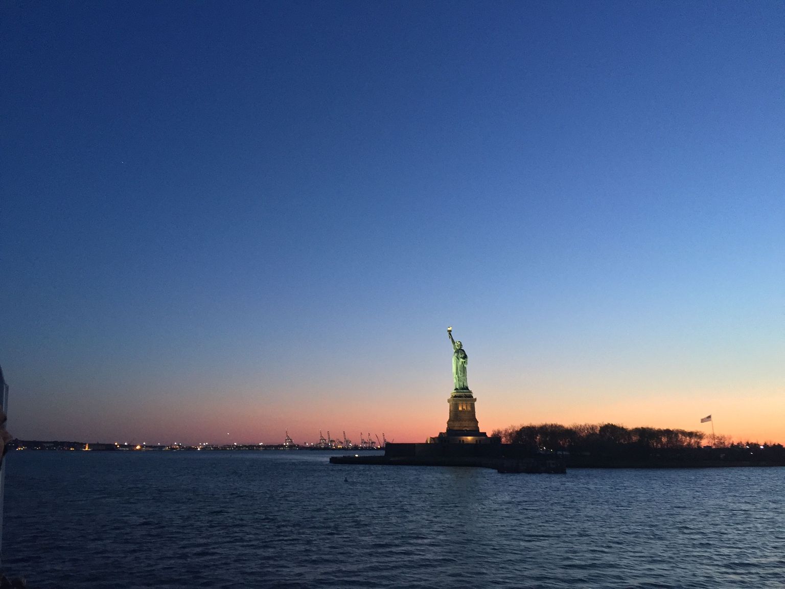 A view of the Statue of Liberty at Sunset