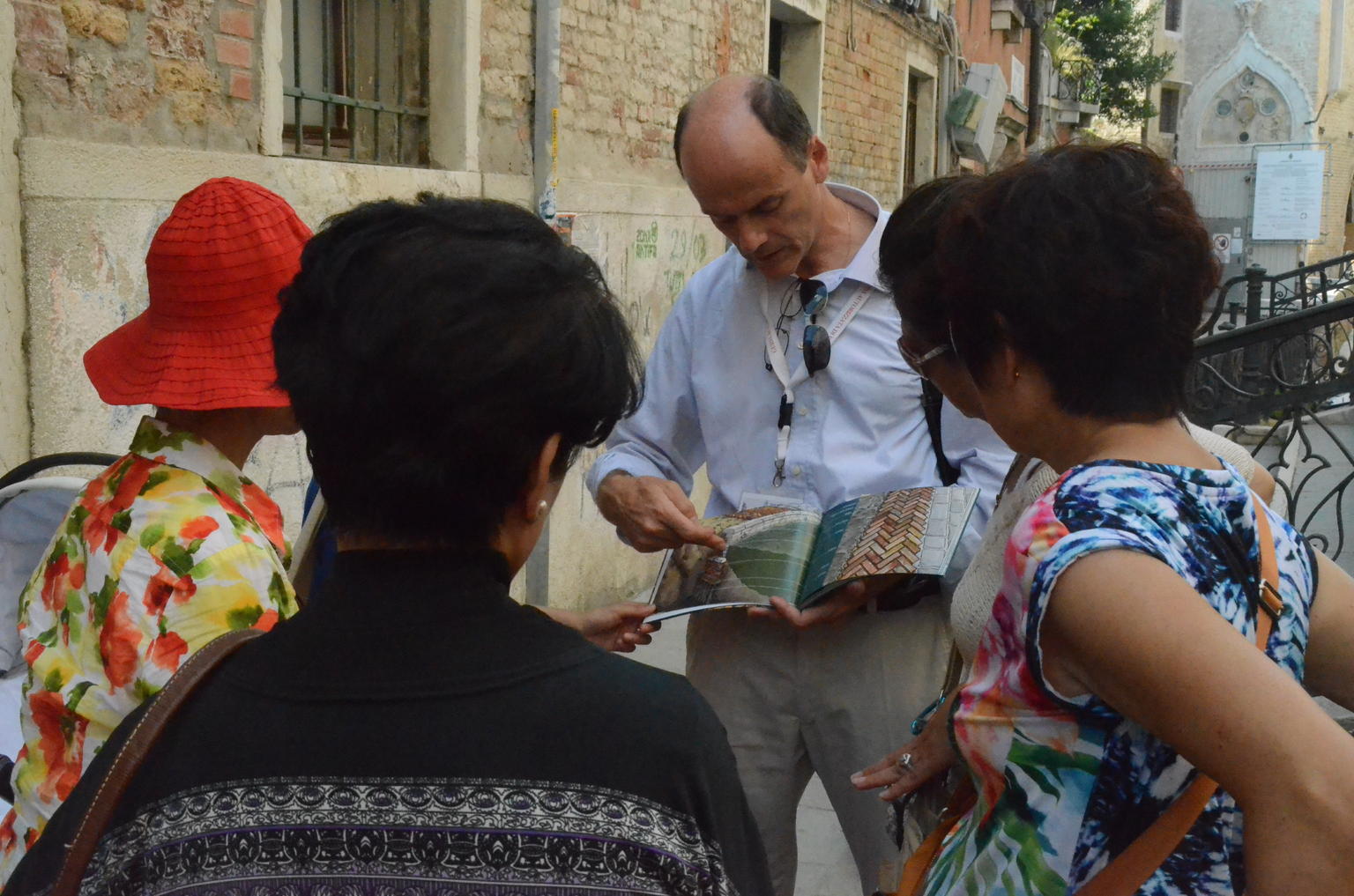 Our guide, Stefano showing us illustrations in his book