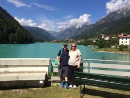 Photo of Lake Katherine Italy Gai and Bernie on the edge of Lake Katherine in the Dolomite region, and yes the lake is really that colour. Beautiful! , Gai K - August 2016