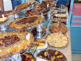 Photo of Les Petits Mitrons Pastry stop on Gourmet Food Walking Tour Delicious rhubarb and plum pie sample , Savvy Sightseer - August 2016