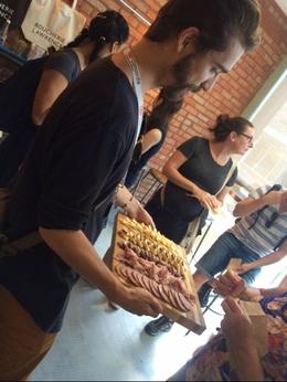 Photo of Charcuterie Sebastian tells us about the meats and cheeses we are about to taste at Boucherie Lawrence. , Sheri P - September 2016