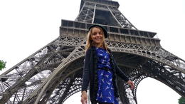 Photo of Our granddaughter getting ready for an Eiffel Tower tour. This is our granddaughter. She is very excited to be at the Eiffel Tower on her first day in Paris! , Preston H - May 2013