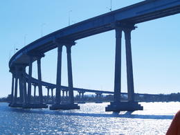 Photo of Cabrillo Bridge, connecting San Diego to Coronado Island San Diego Harbor Tour - Friday, August 15, 2014. Cabrillo Bridge to Coronado Island as seen just after passing under it from the tour boat. , Carrie Mc - August 2014