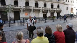 Photo of In front of the NYSE Our tour guide George gives us the introduction in front of the New York Stock Exchange. , Hagenn - October 2015