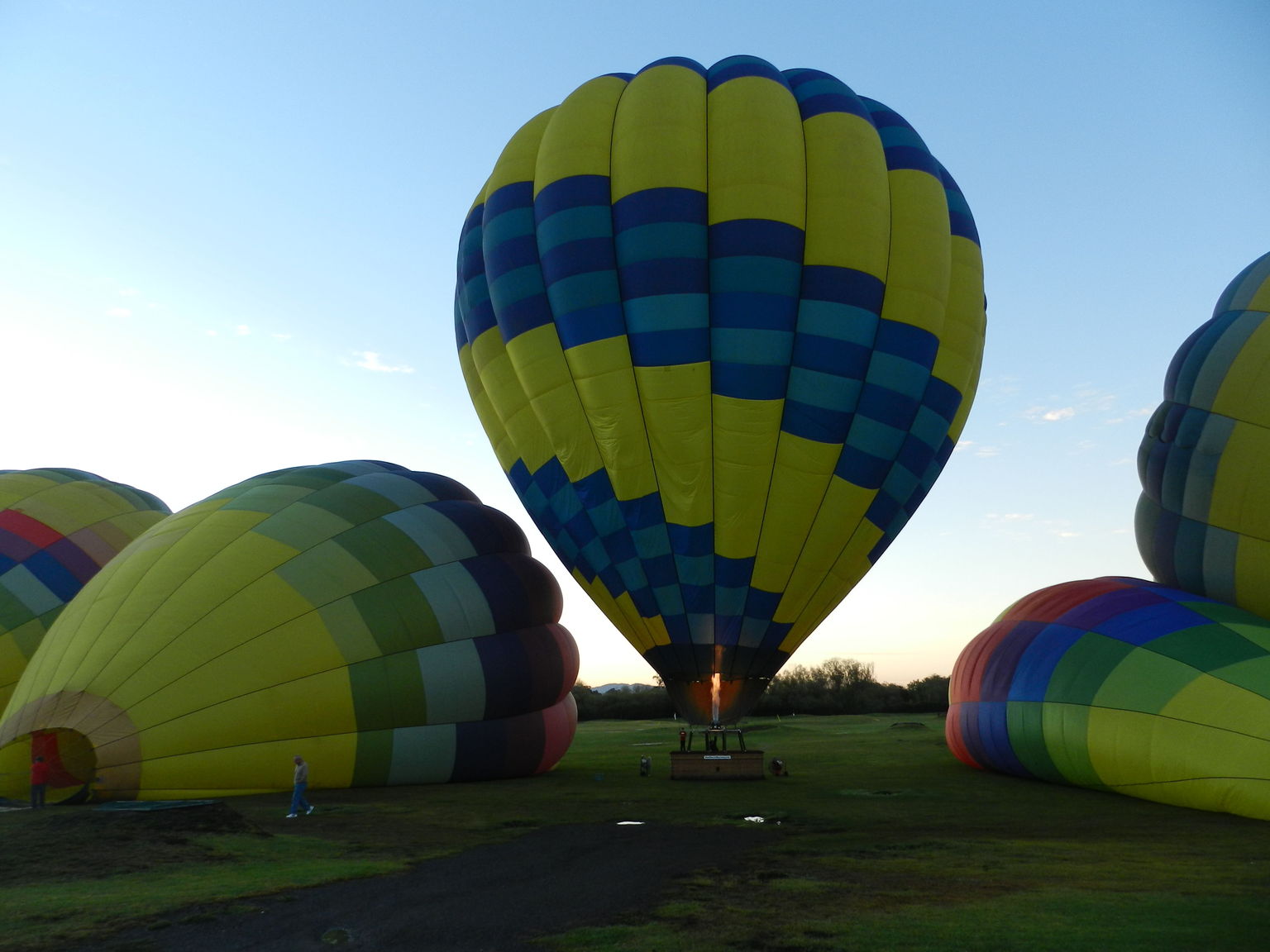 Balloons on the field getting ready for take-off