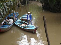 Photo of Return Journey The small boats we board en route to our main boat to take us back to My Tho., Justin L - January 2009