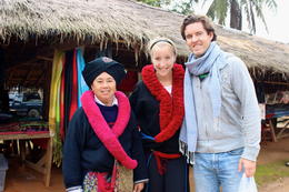 Photo of Hanging out with the Yao Hill Tribe The woman in the Yao tribe let me try on their traditional dress! , Laura S - January 2014